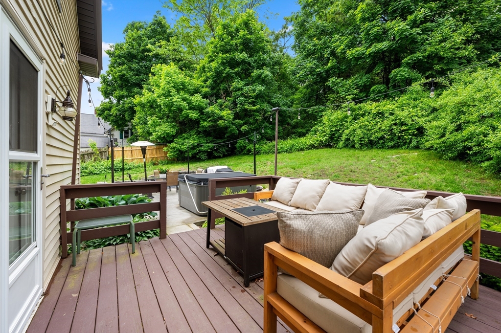 128 Pleasant Street Franklin, MA 02038 - Photo 16 of 19 a view of outdoor sitting area with furniture and garden