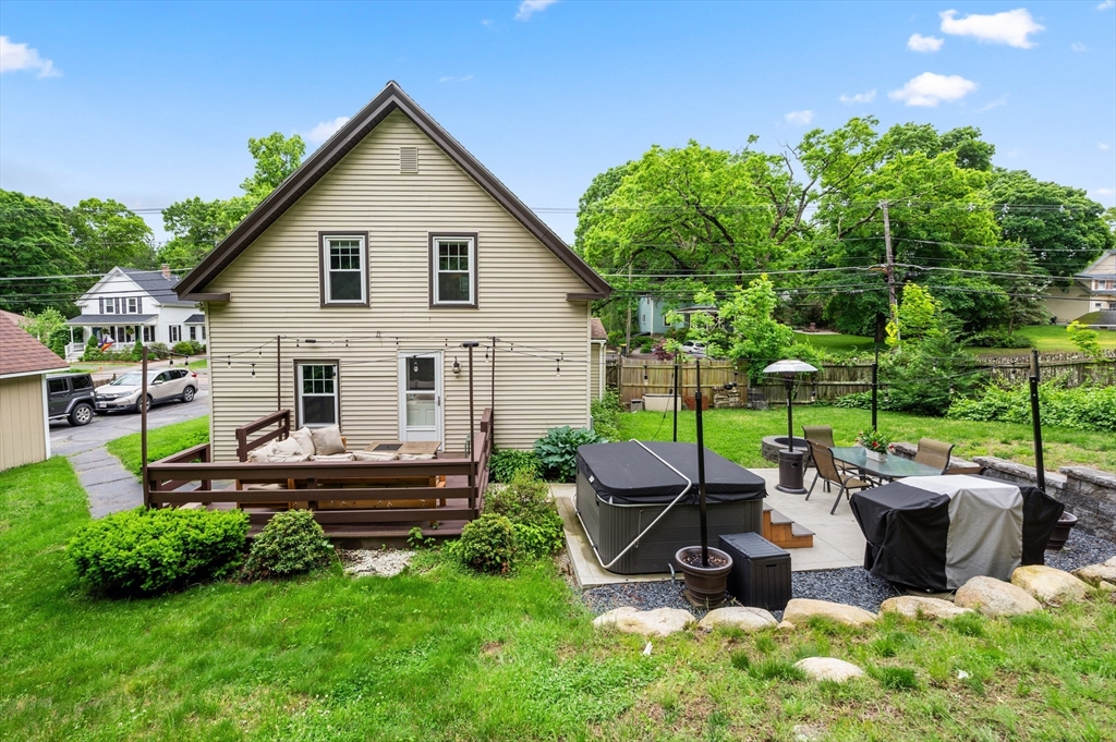 128 Pleasant Street Franklin, MA 02038 - Photo 17 of 19 a view of a backyard with sitting area