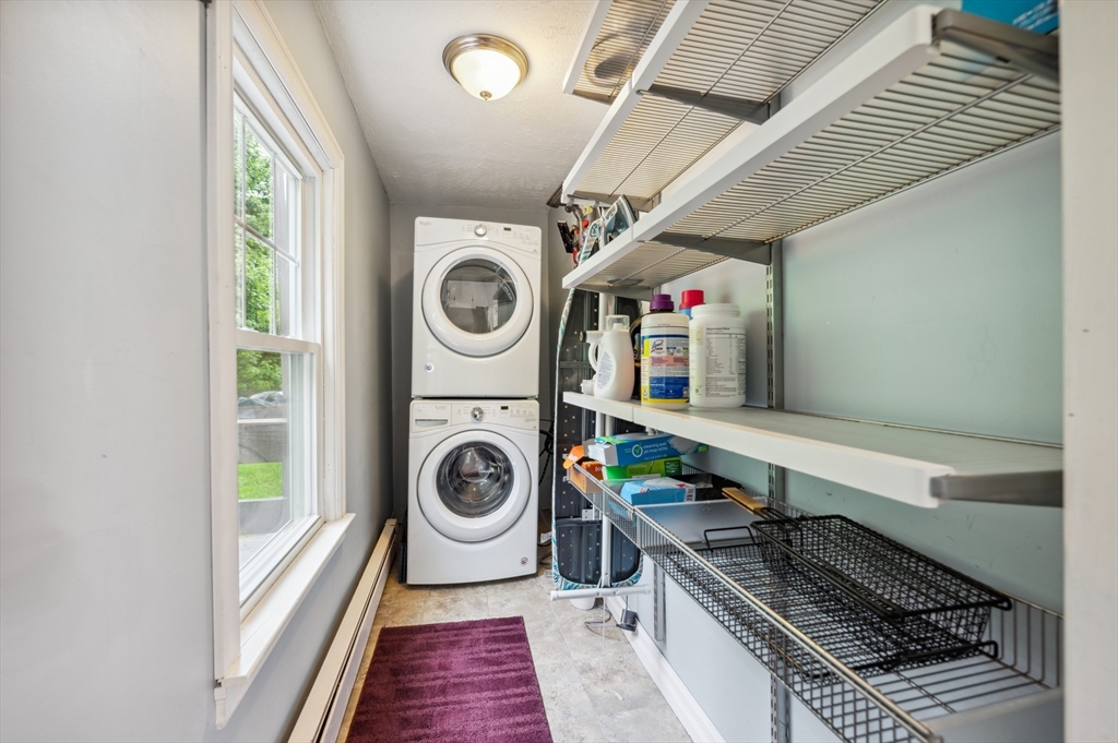 128 Pleasant Street Franklin, MA 02038 - Photo 8 of 19 a utility room with dryer and washer