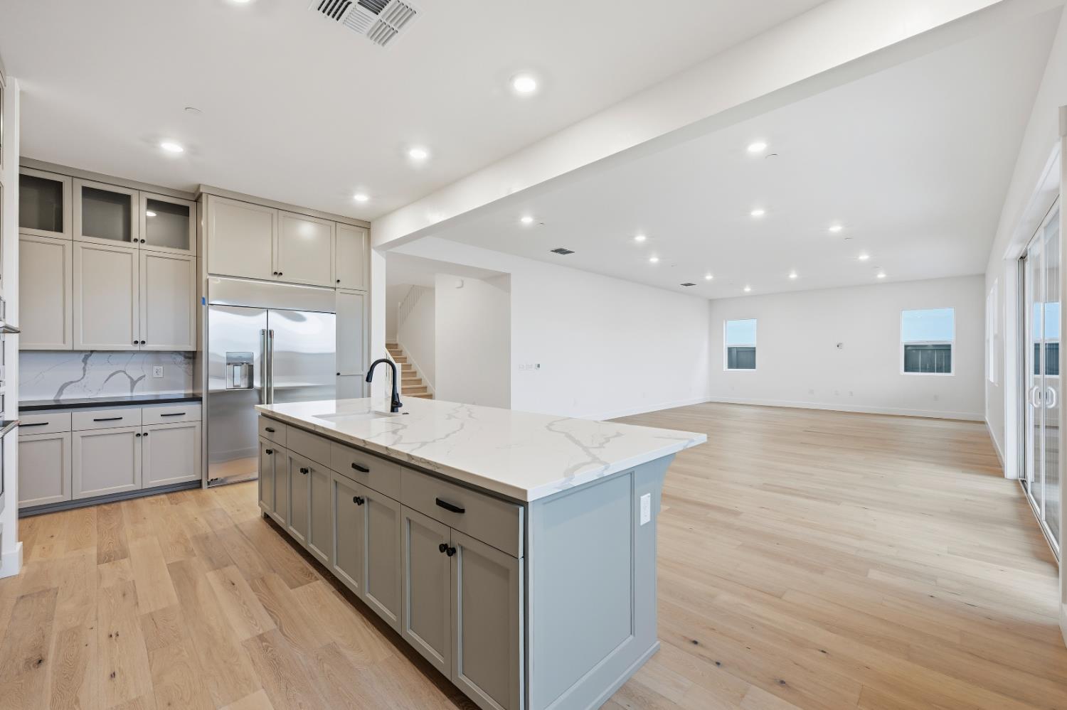 3034 Sidewinder Loop Rocklin, CA 95765 - Photo 11 of 37 a kitchen with a sink microwave and cabinets