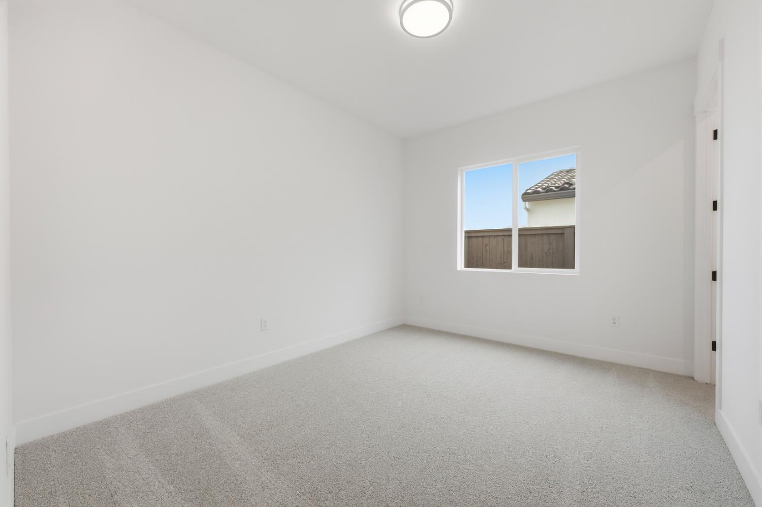 3034 Sidewinder Loop Rocklin, CA 95765 - Photo 21 of 37 a view of an empty room with a window