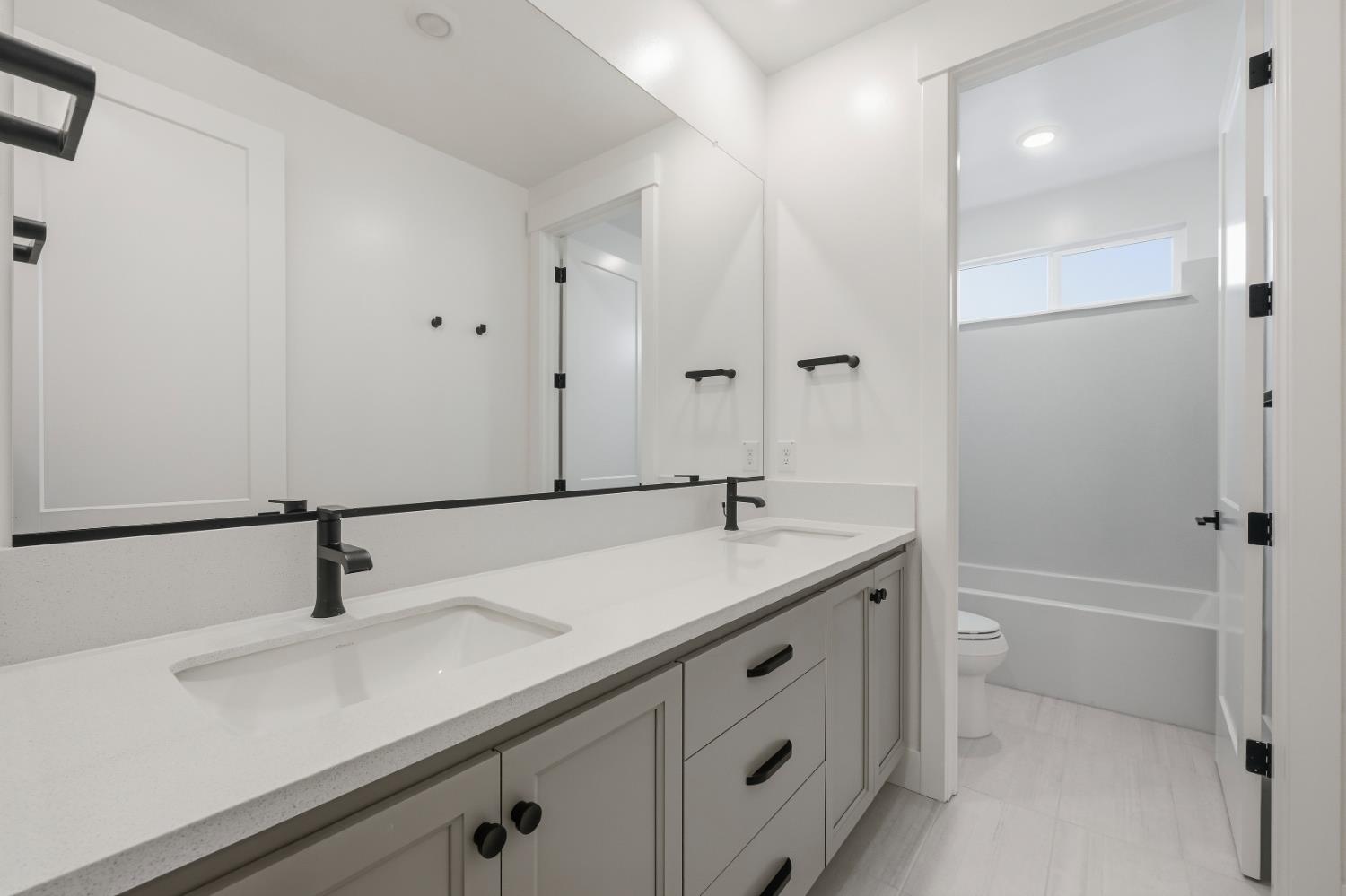 3034 Sidewinder Loop Rocklin, CA 95765 - Photo 25 of 37 a bathroom with a sink and a mirror