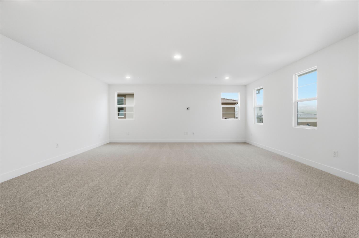 3034 Sidewinder Loop Rocklin, CA 95765 - Photo 27 of 37 an empty room with windows