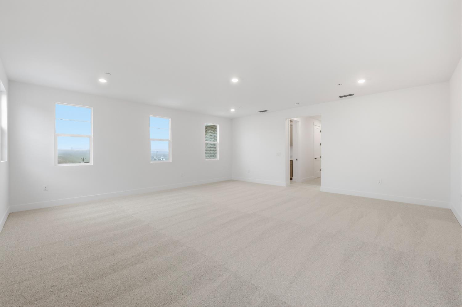 3034 Sidewinder Loop Rocklin, CA 95765 - Photo 29 of 37 an empty room with windows and closet