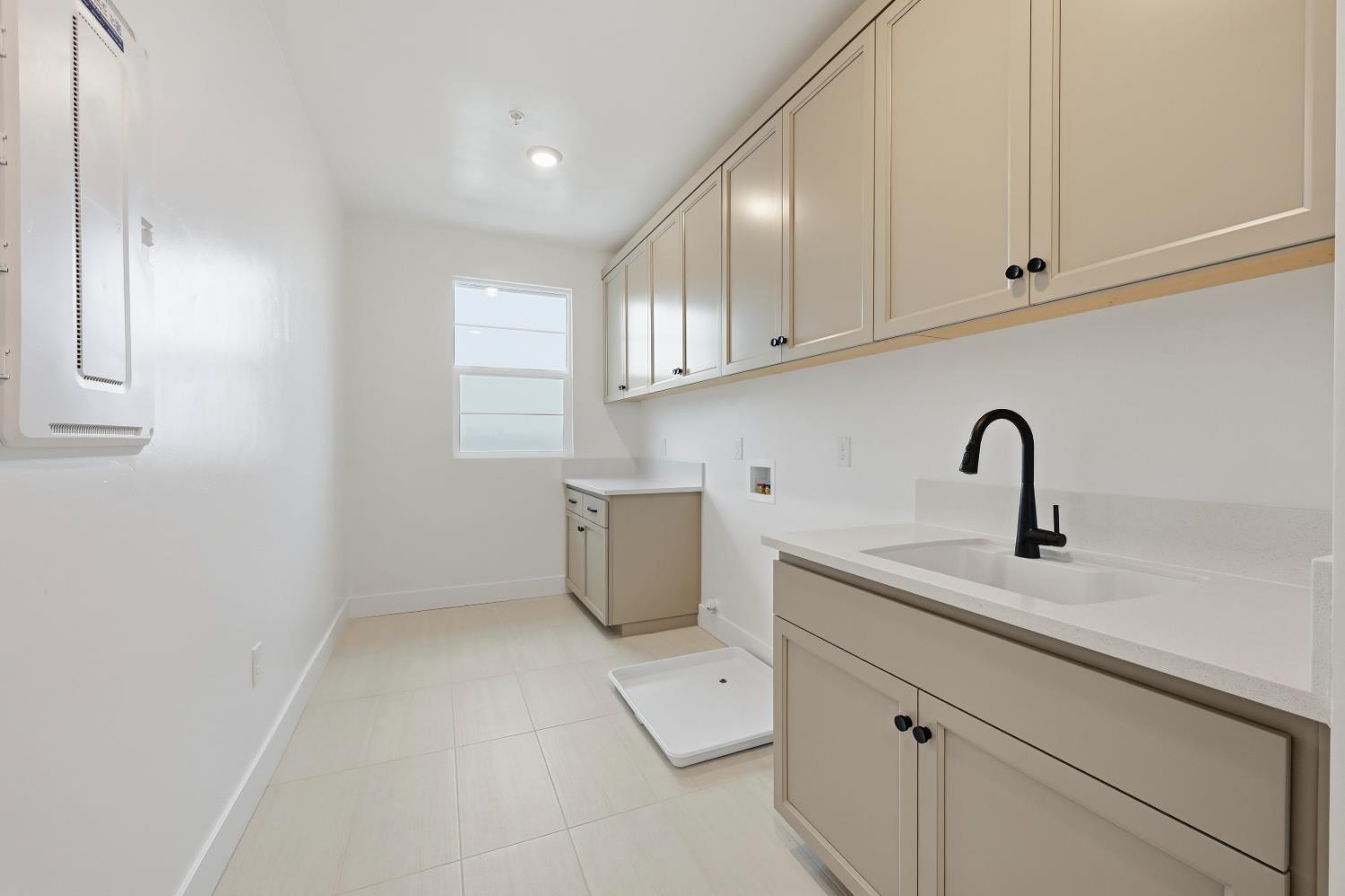3034 Sidewinder Loop Rocklin, CA 95765 - Photo 30 of 37 a view of cabinets with sink