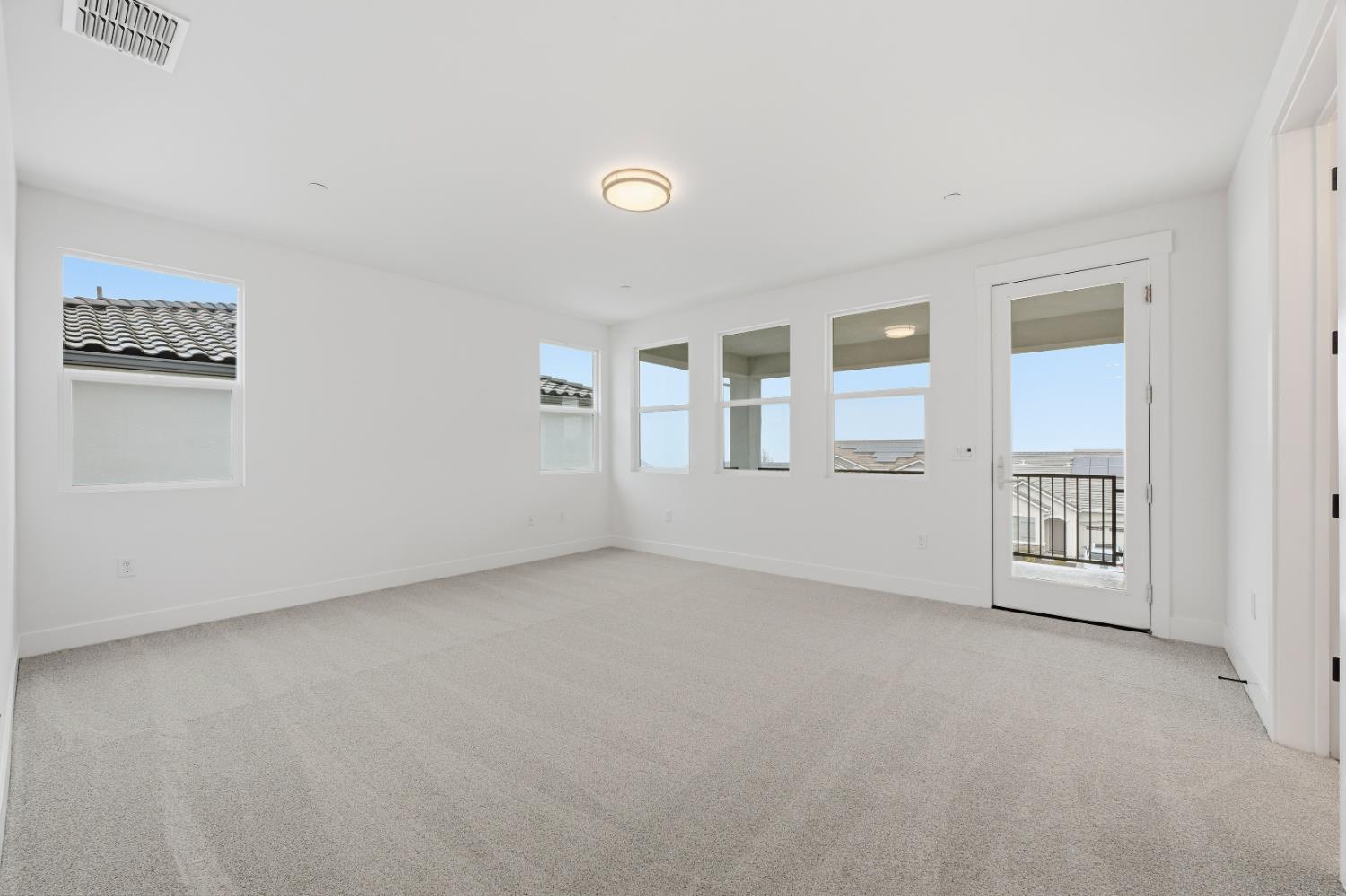 3034 Sidewinder Loop Rocklin, CA 95765 - Photo 31 of 37 an empty room with windows