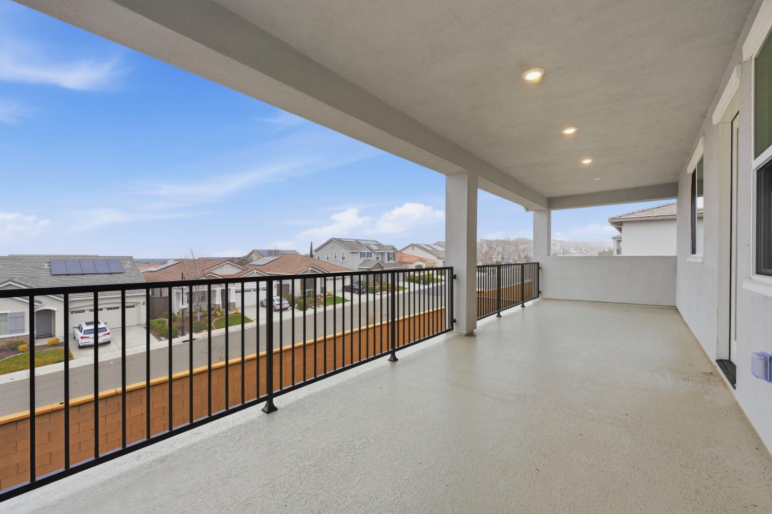 3034 Sidewinder Loop Rocklin, CA 95765 - Photo 37 of 37 a view of a large room with large windows