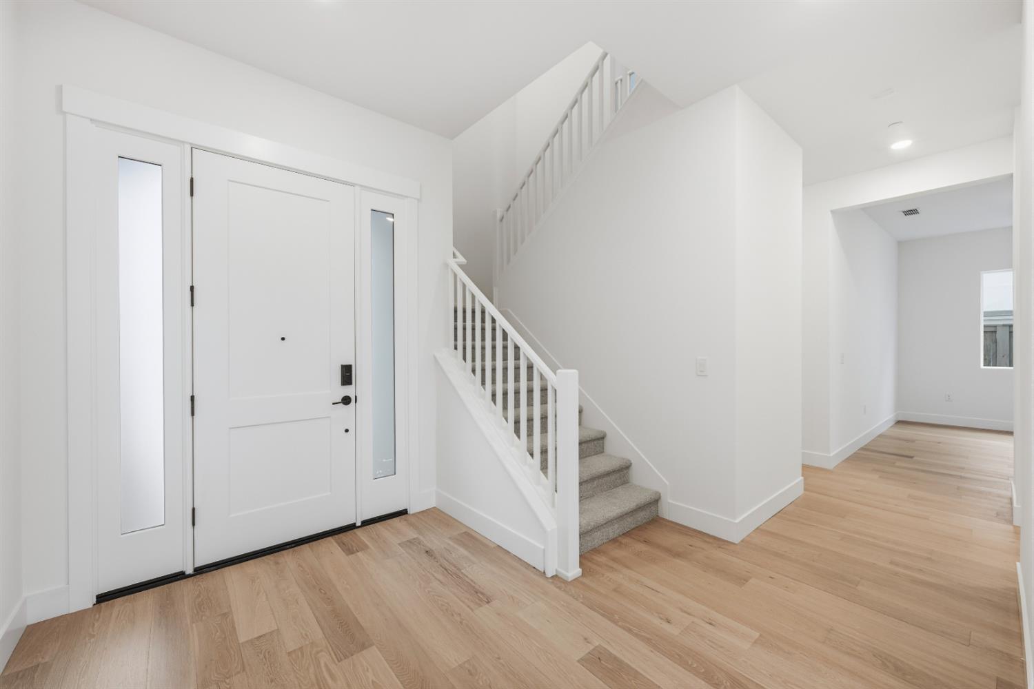 3034 Sidewinder Loop Rocklin, CA 95765 - Photo 8 of 37 a view of an entryway with wooden floor