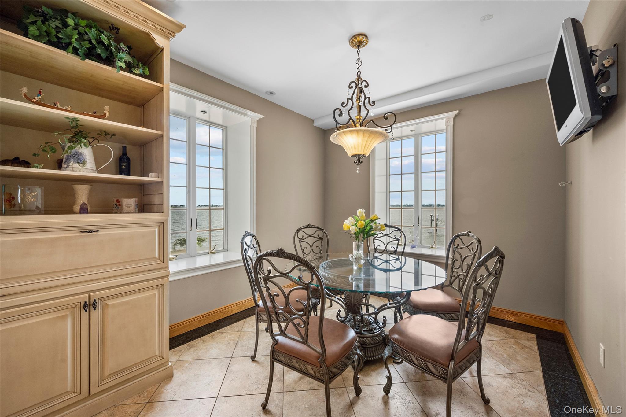 3407 Country Club Road Bronx, NY 10465 - Photo 15 of 34 Dining area featuring light tile patterned flooring and baseboards