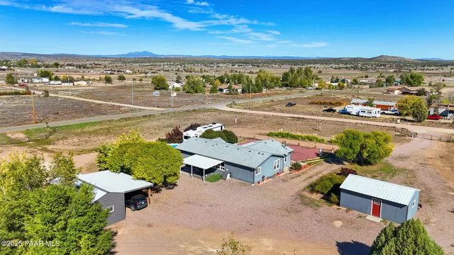 an aerial view of a house with a outdoor space