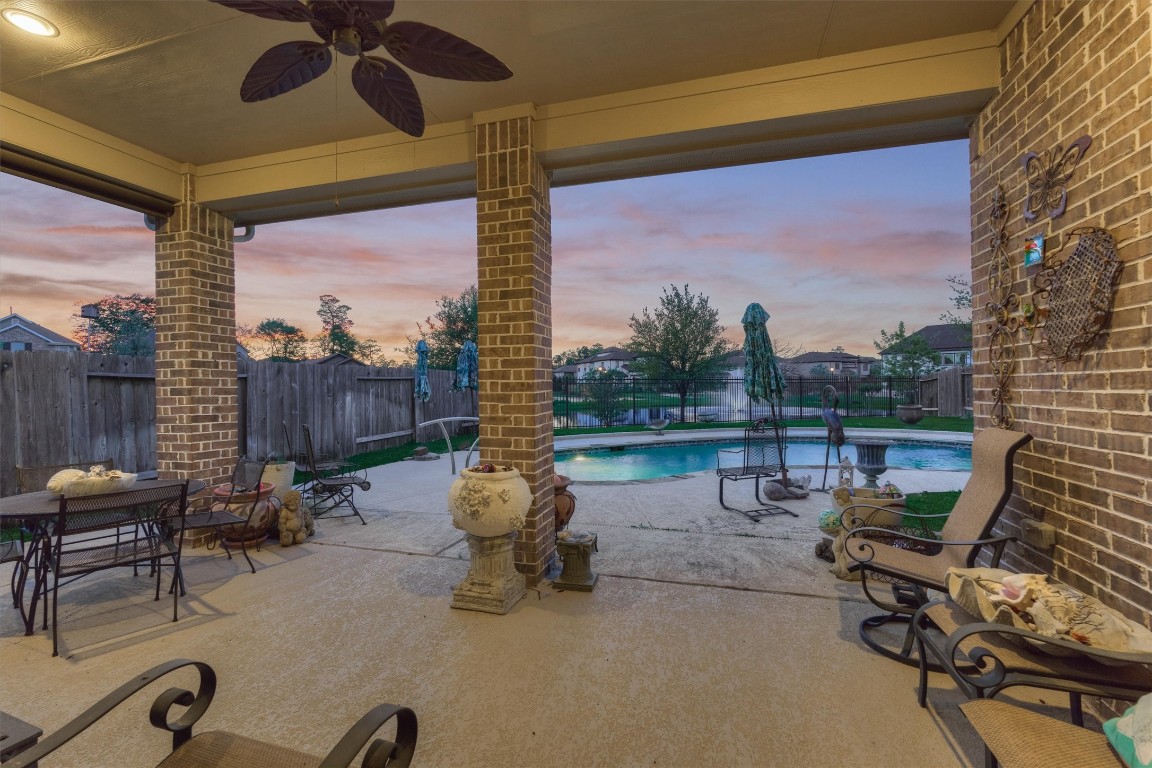 7430 Kearney Hill Lane Spring, TX 77389 - Photo 41 of 47 Another shot of the covered patio with cool deck and outdoor ceiling fan