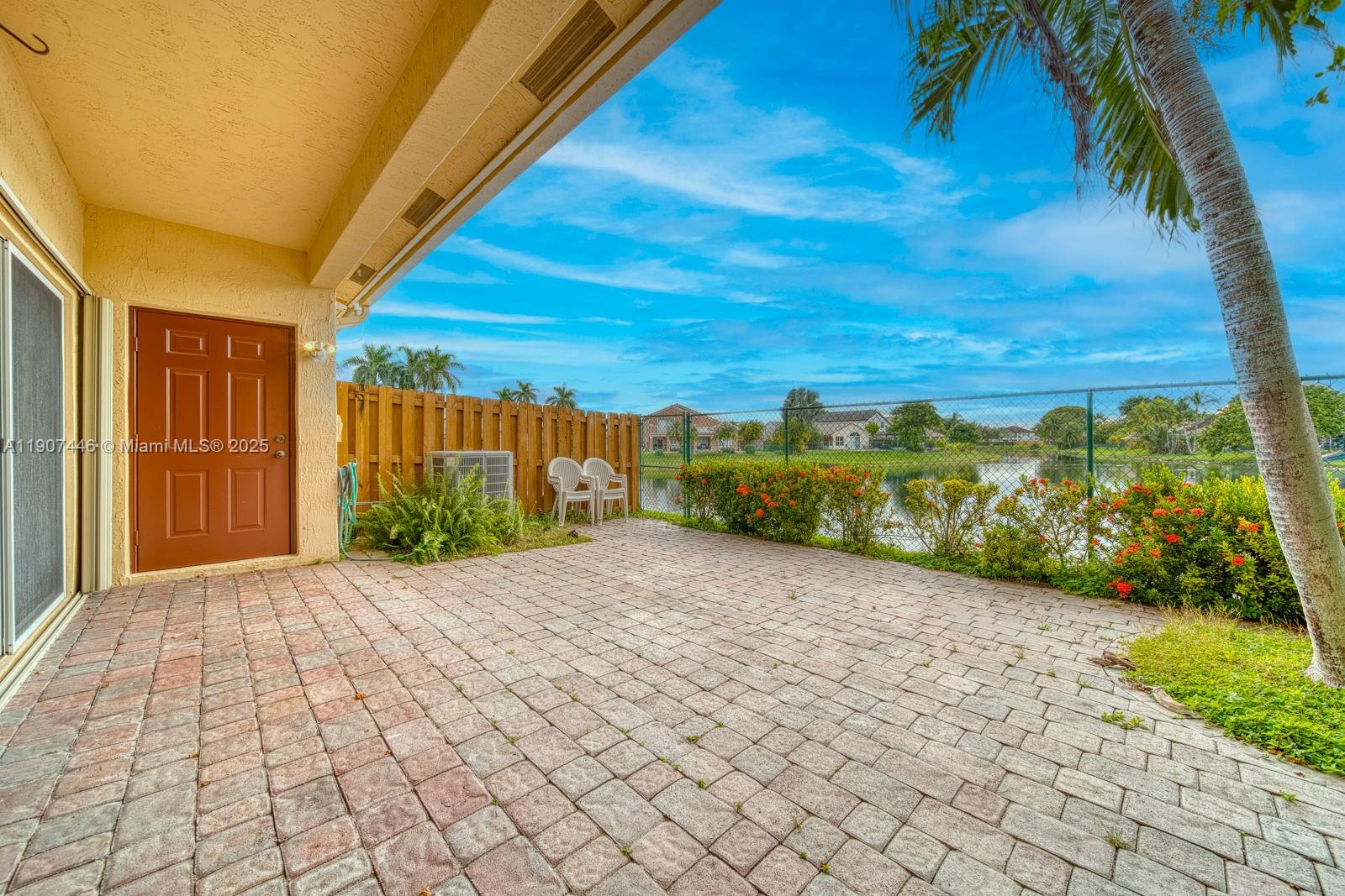 16394 Southwest 75th Street Miami, FL 33193 - Photo 29 of 35 a view of a pathway with a yard