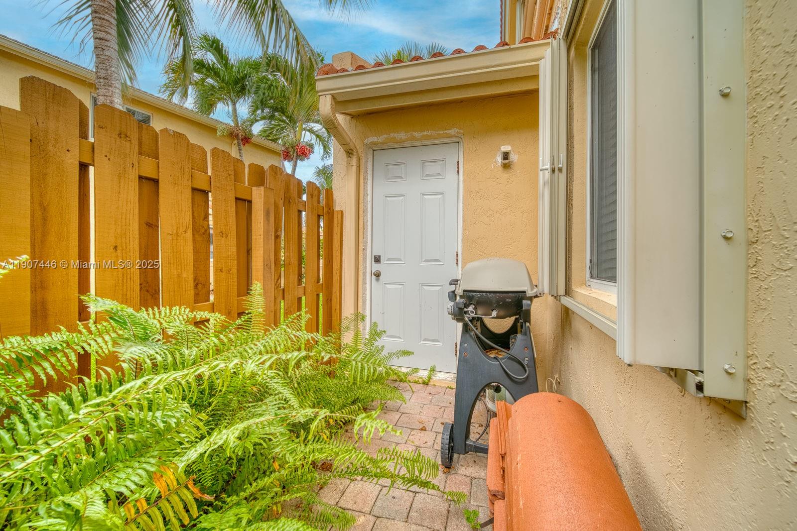 16394 Southwest 75th Street Miami, FL 33193 - Photo 33 of 35 a bathroom with a sink and mirror