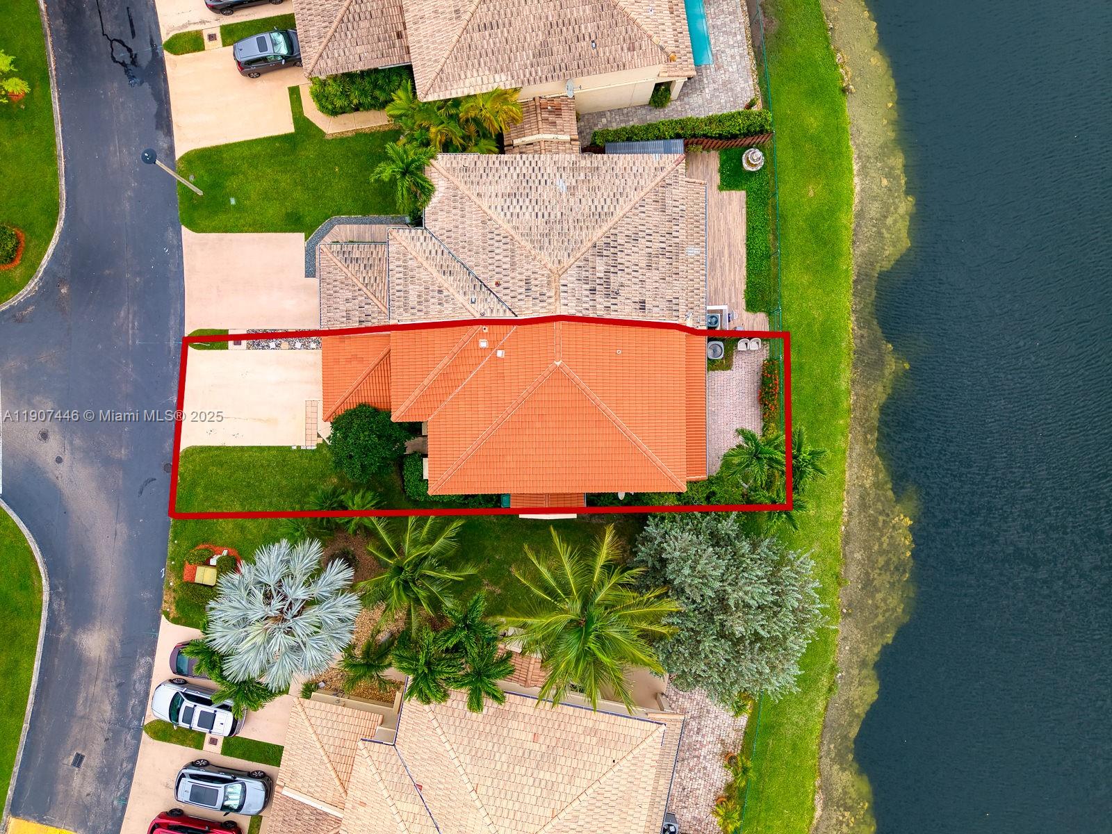 16394 Southwest 75th Street Miami, FL 33193 - Photo 5 of 35 an aerial view of a house with a garden and yard