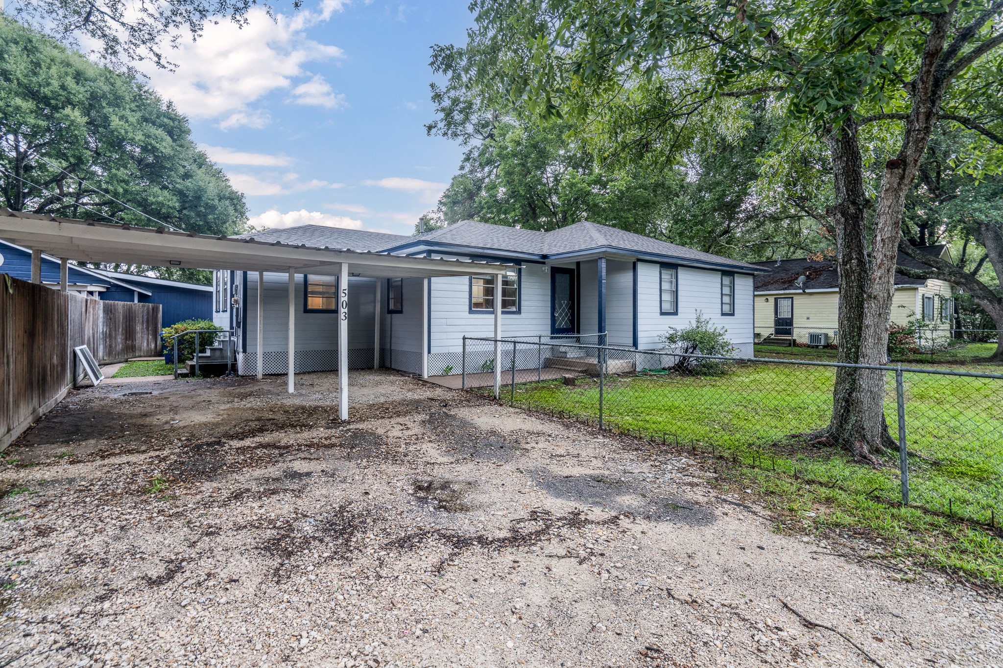 503 Carrell Street Tomball, TX 77375 - Photo 8 of 31 a front view of house with yard and green space
