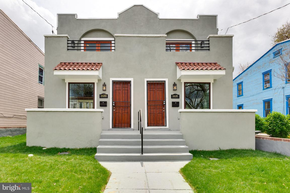 a front view of building with yard