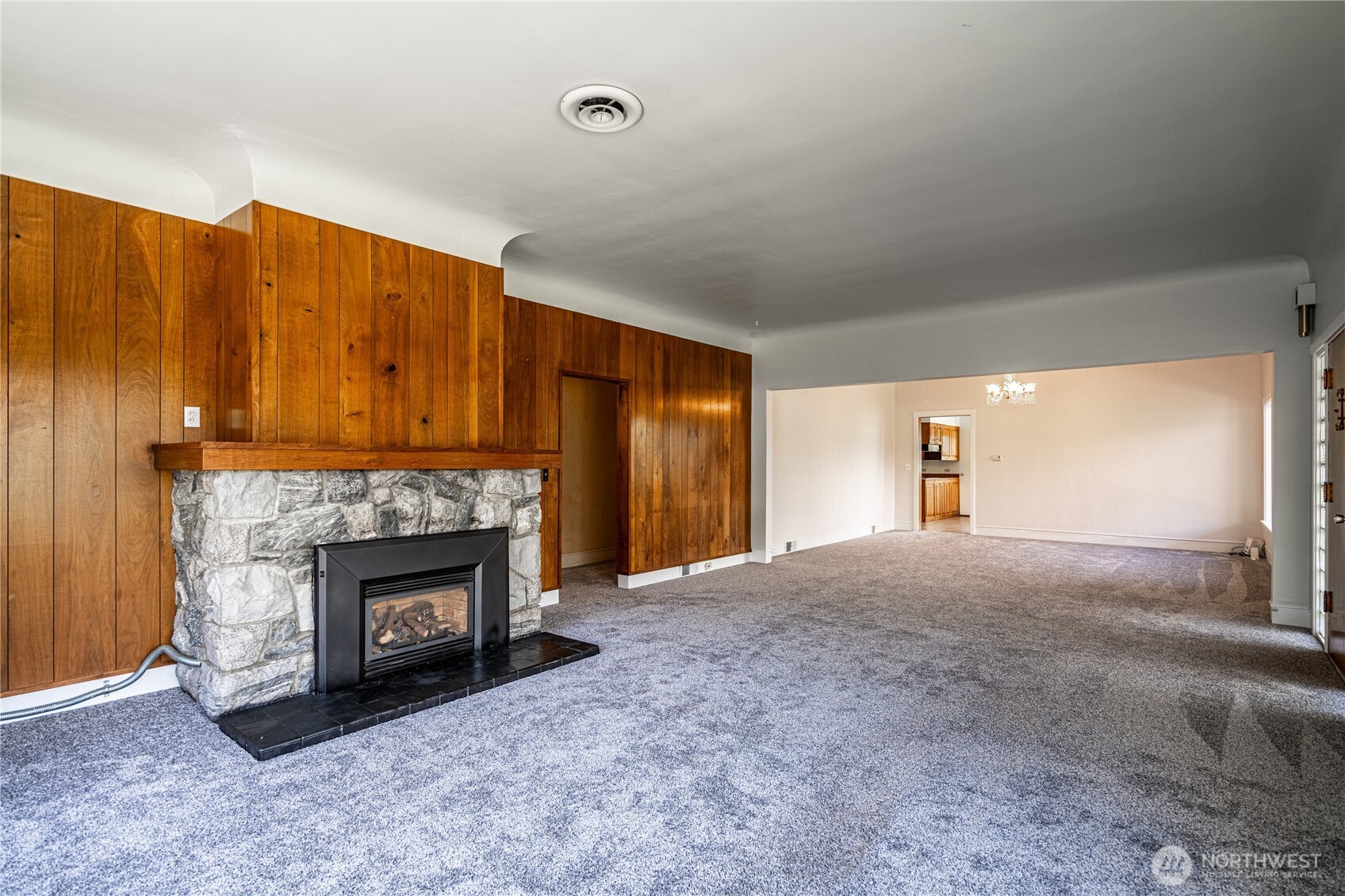 15 Beebe Fish Hatchery Road Chelan, WA 98816 - Photo 14 of 40 a view of an empty room with a fireplace