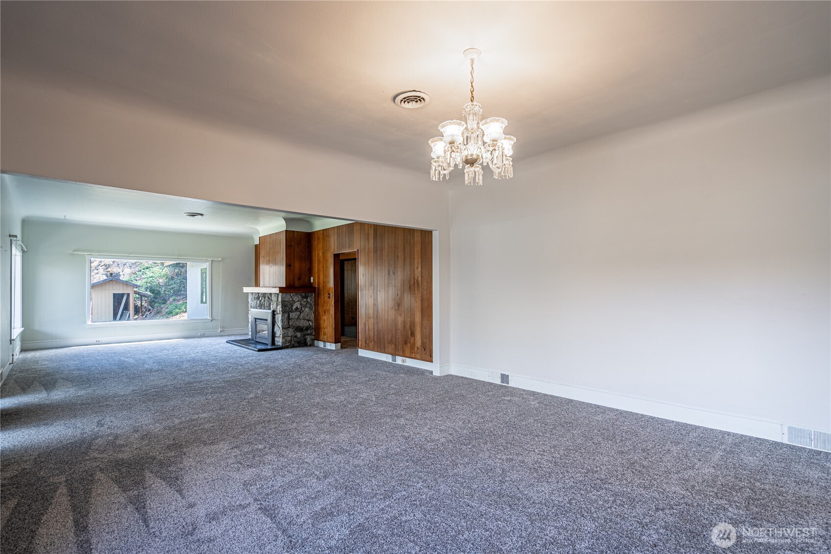 15 Beebe Fish Hatchery Road Chelan, WA 98816 - Photo 15 of 40 a view of a livingroom with a chandelier