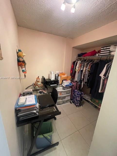 14250 Southwest 62nd Street, Unit 320 Miami, FL 33183 - Photo 12 of 14 a view of a workspace with furniture