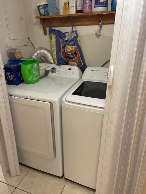 14250 Southwest 62nd Street, Unit 320 Miami, FL 33183 - Photo 13 of 14 a utility room with dryer and washer