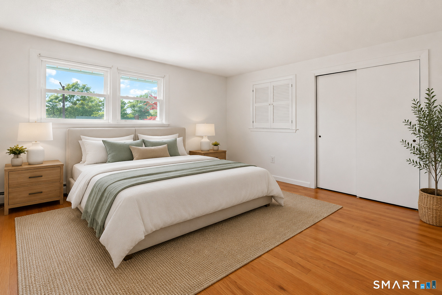 142 Wolcott Hill Road Wethersfield, CT 06109 - Photo 15 of 29 a bedroom with a large bed and a window