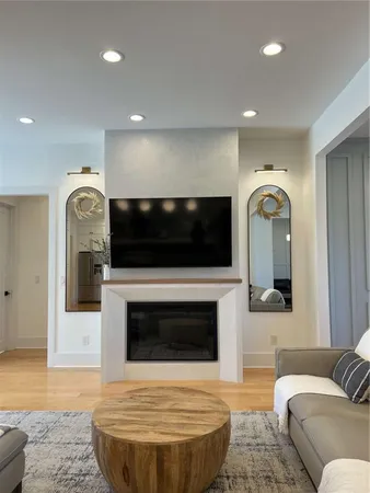a living room with a couch and a window