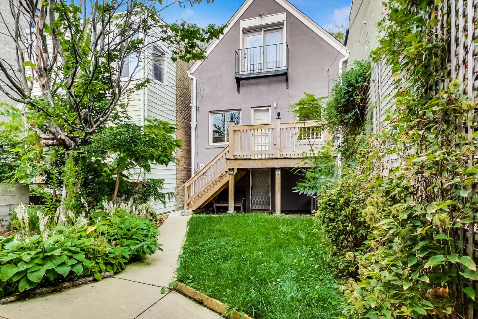 2035 West Rice Street Chicago, IL 60622 - Photo 17 of 27 a house view with a garden space