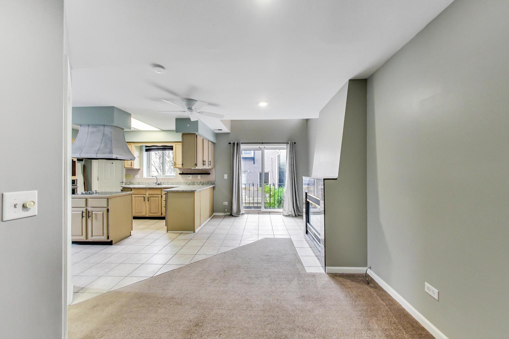 2035 West Rice Street Chicago, IL 60622 - Photo 19 of 27 a view of kitchen with stainless steel appliances refrigerator oven and cabinets
