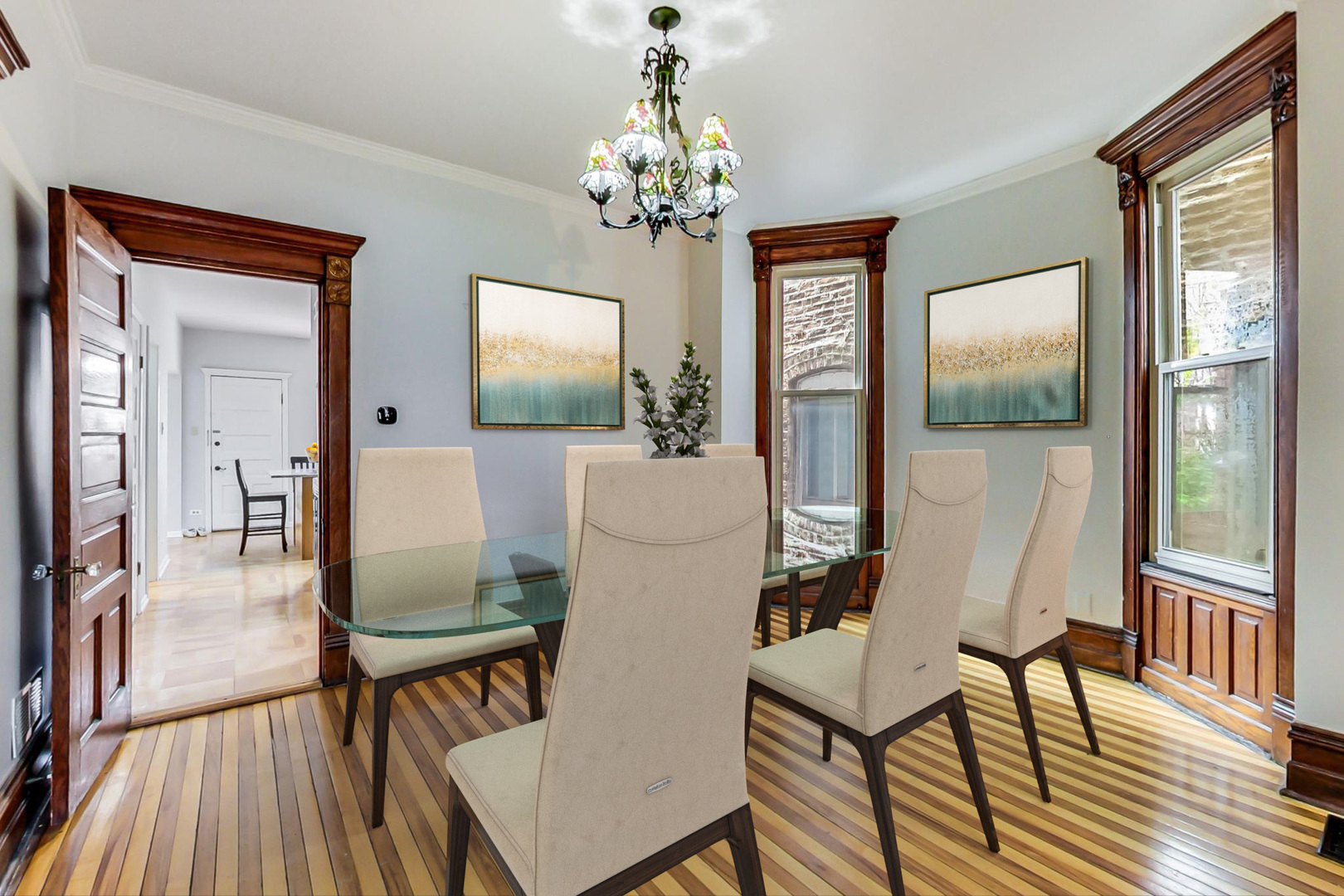 2035 West Rice Street Chicago, IL 60622 - Photo 5 of 27 a view of a dining room with furniture a chandelier and wooden floor
