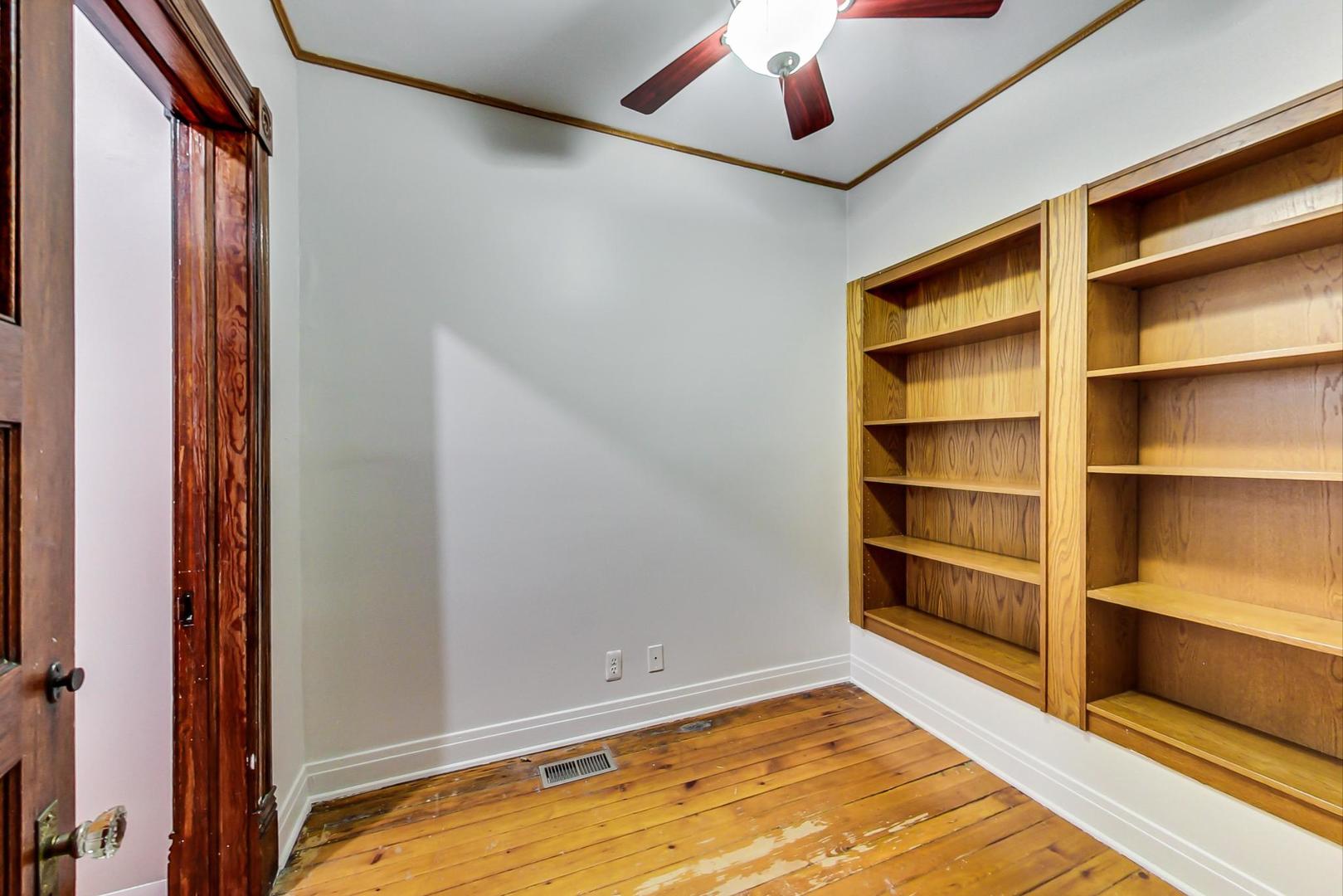 2035 West Rice Street Chicago, IL 60622 - Photo 8 of 27 a view of room with closet and window