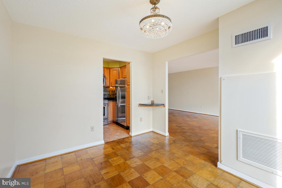 2100 Washington Avenue, Unit 9B Silver Spring, MD 20910 - Photo 11 of 60 Dining Area with Entry to Kitchen