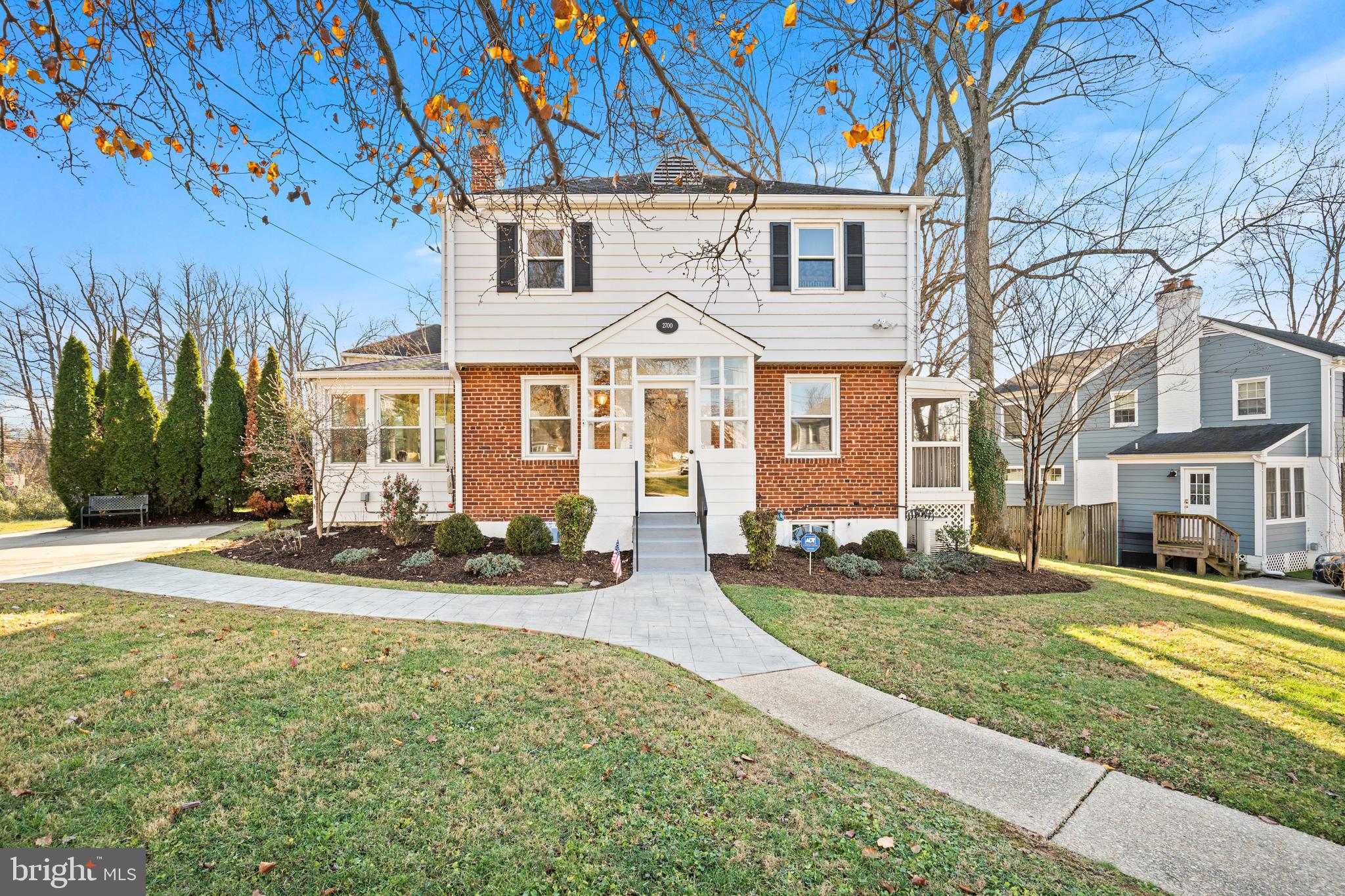 2700 Spencer Road Chevy Chase, MD 20815 - Photo 1 of 40 a front view of a house with a yard
