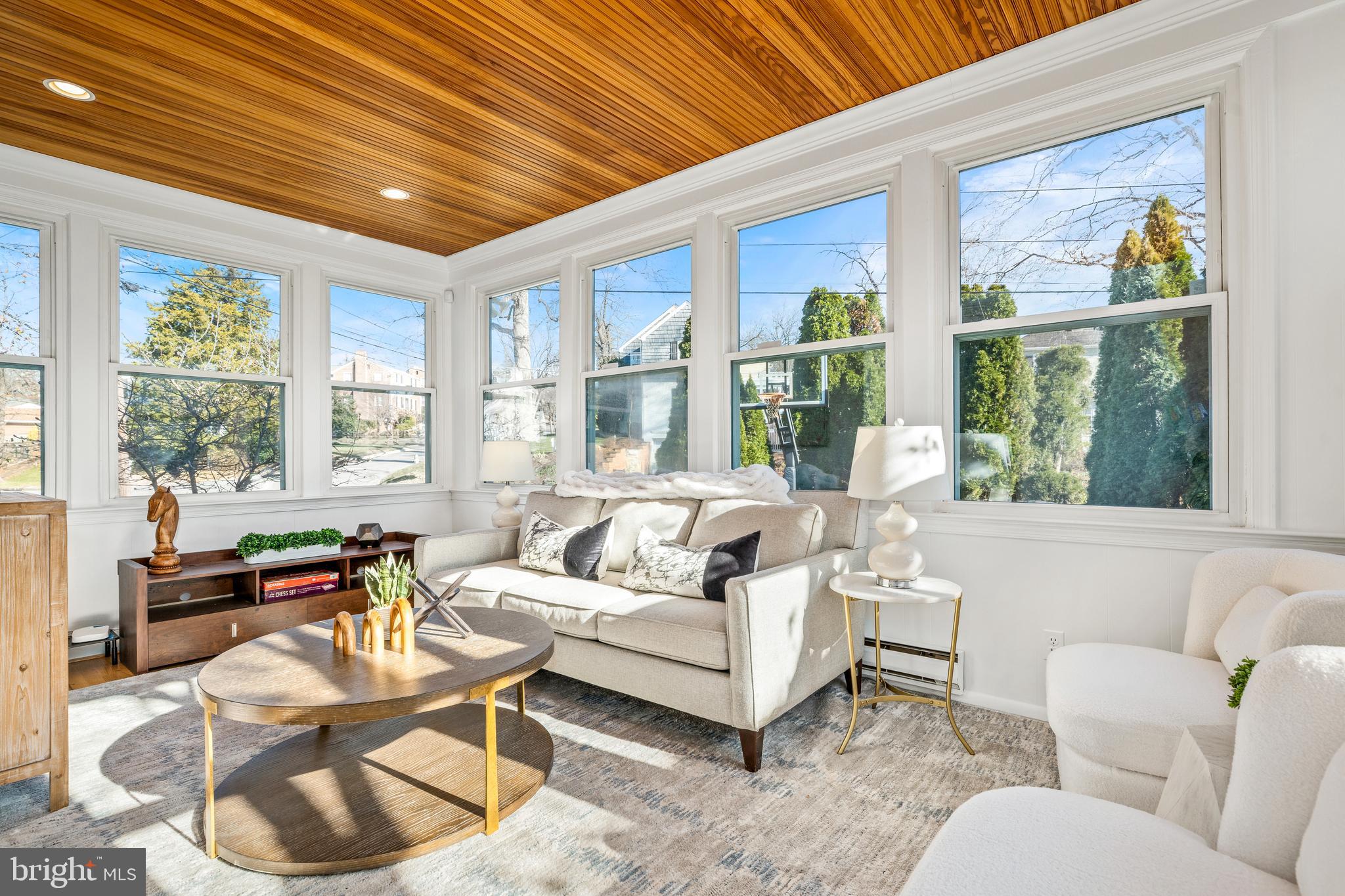 2700 Spencer Road Chevy Chase, MD 20815 - Photo 16 of 40 a living room with furniture and a large window