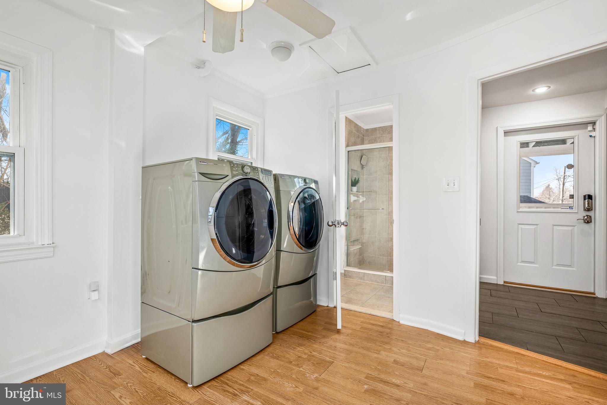 2700 Spencer Road Chevy Chase, MD 20815 - Photo 17 of 40 a utility room with dryer and washer