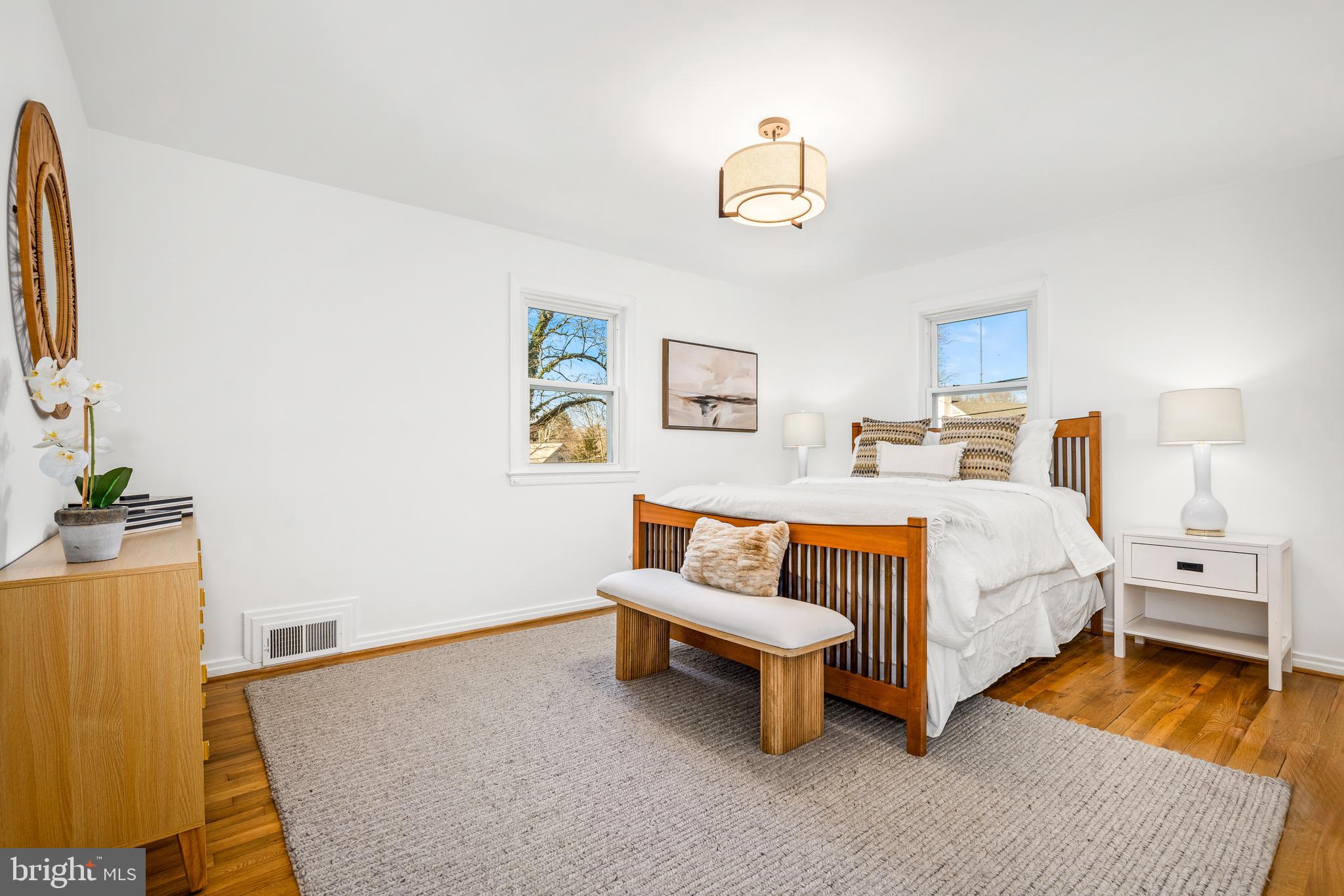 2700 Spencer Road Chevy Chase, MD 20815 - Photo 23 of 40 a bedroom with a bed and a couch