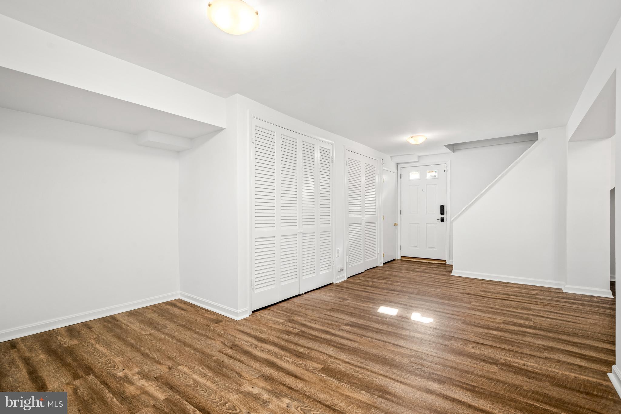 2700 Spencer Road Chevy Chase, MD 20815 - Photo 31 of 40 a view of empty room with wooden floor