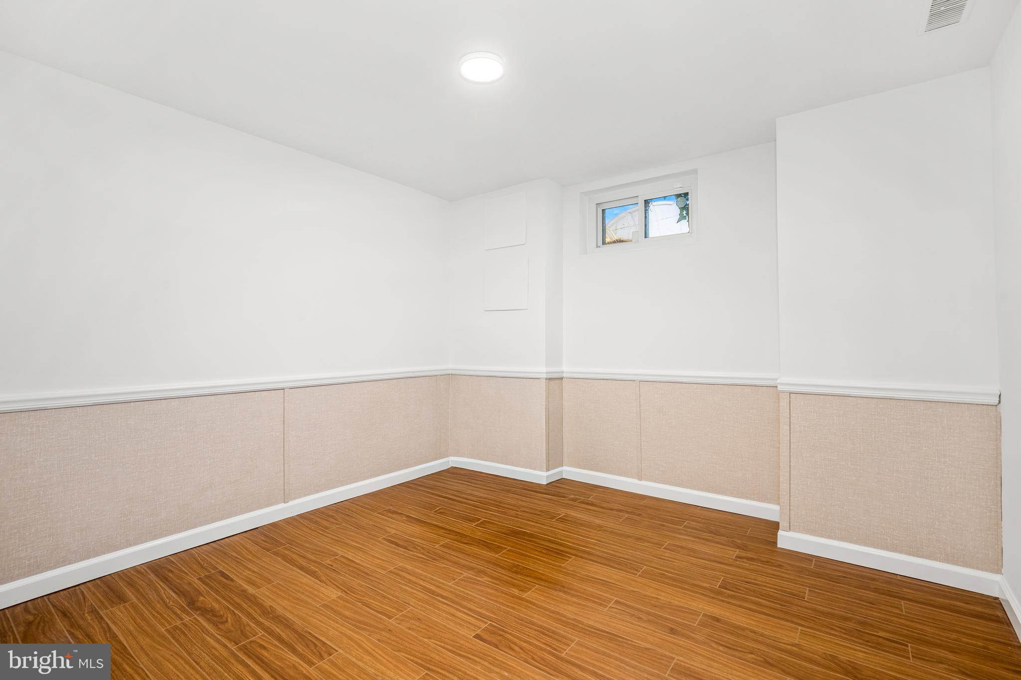 2700 Spencer Road Chevy Chase, MD 20815 - Photo 34 of 40 a view of a room with wooden floor