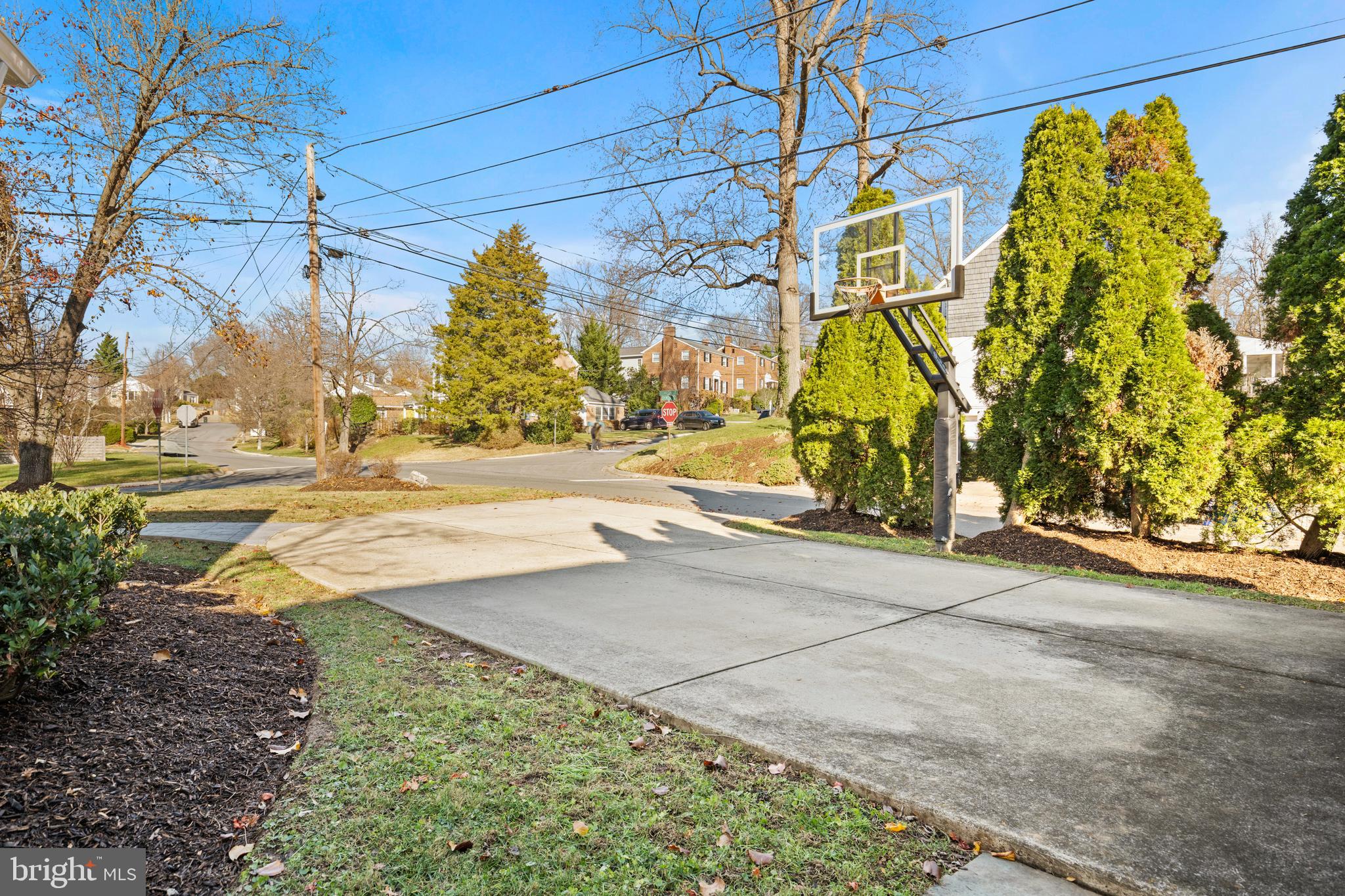 2700 Spencer Road Chevy Chase, MD 20815 - Photo 38 of 40 a view of street along with trees