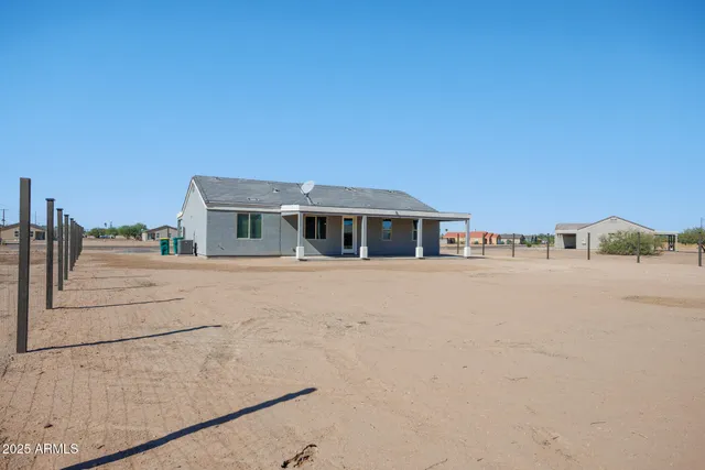 a front view of house with a yard