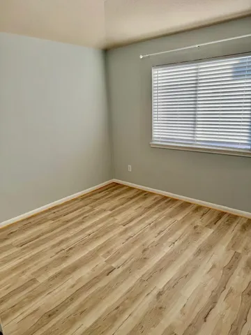 a bathroom with a bathtub and a sink