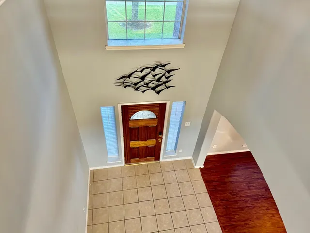 view of stairs with wooden floor