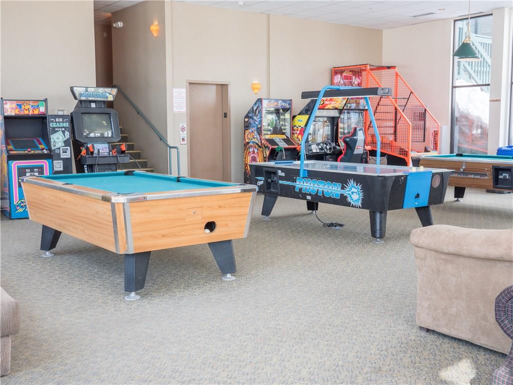 8100 Ryan Gulch Road, Unit E206 Silverthorne, CO 80498 - Photo 32 of 32 a room with furniture and toys