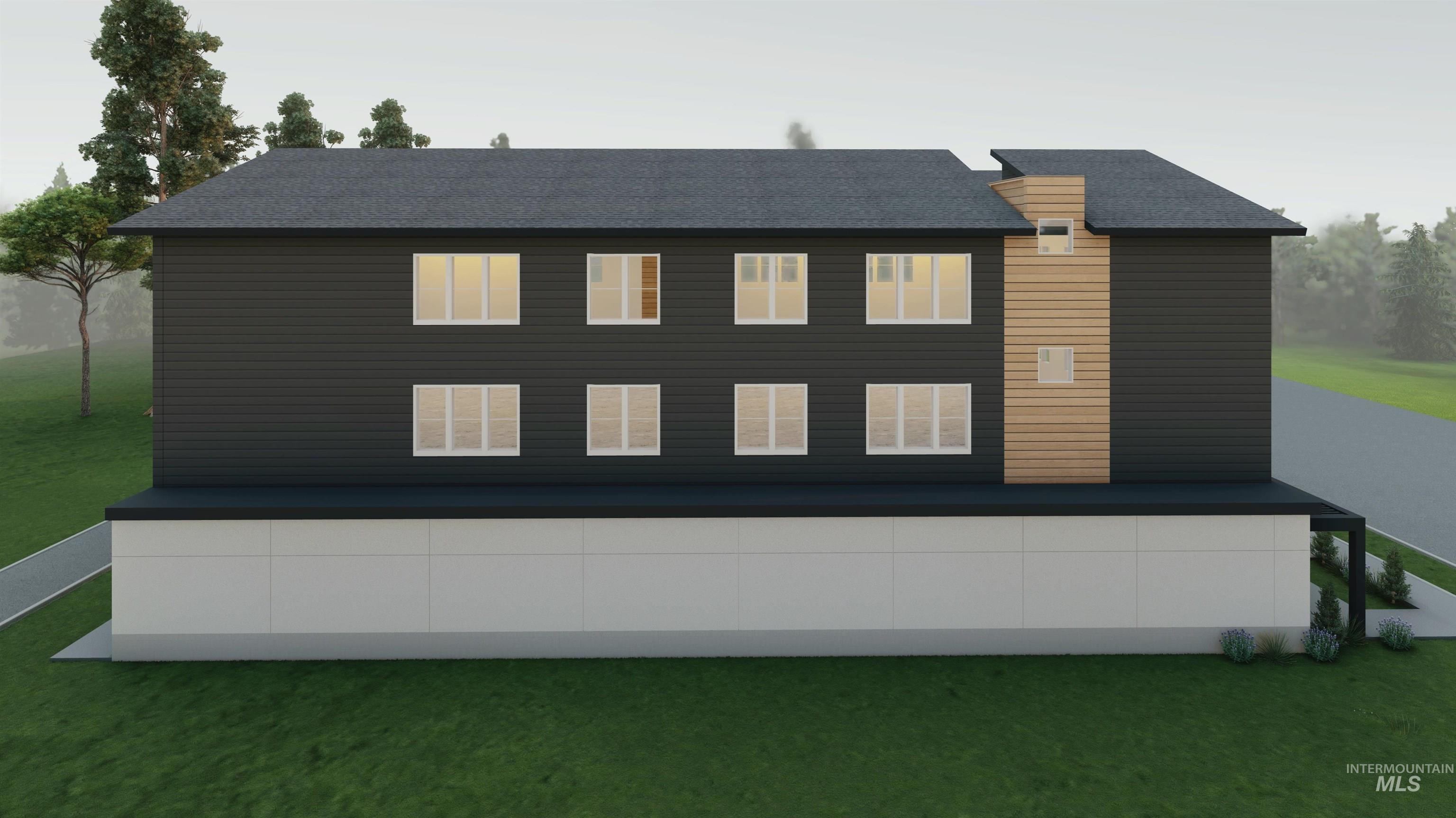 1015 North 29th Street Boise, ID 83702 - Photo 8 of 11 Back of property featuring a lawn and a shingled roof