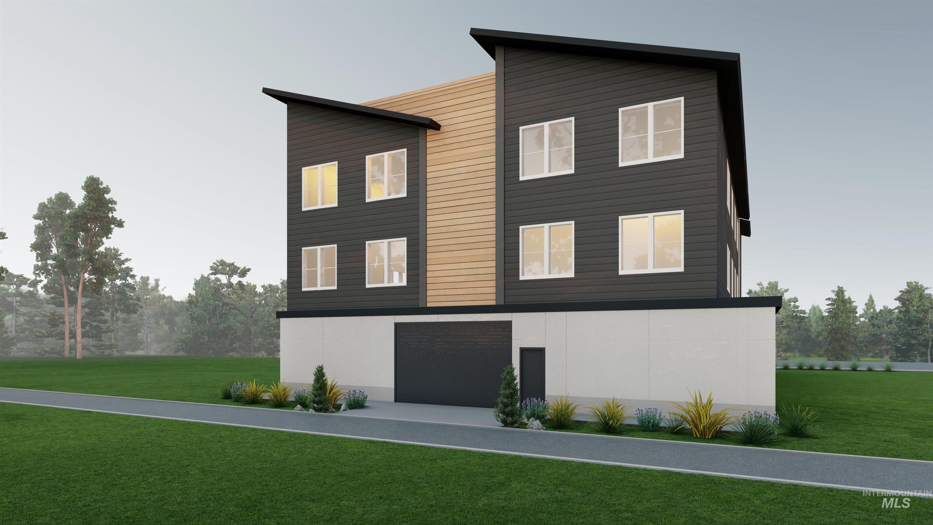 1015 North 29th Street Boise, ID 83702 - Photo 9 of 11 View of front of property with a front lawn and a garage