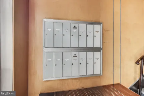 a picture of a bench in front of a door