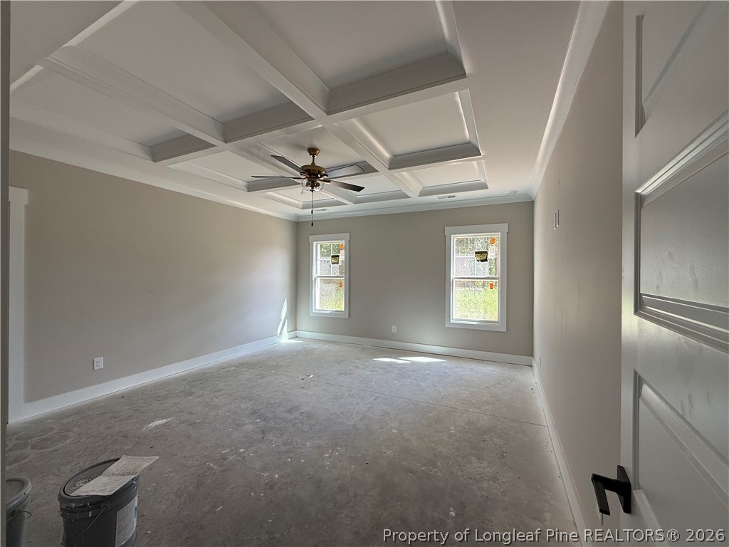 132 Ridge Stone Drive Autryville, NC 28318 - Photo 11 of 26 a view of empty room with window and ceiling fan