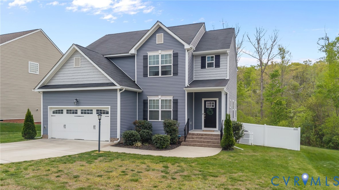 4237 Wells Ridge Court Chester, VA 23831 - Photo 2 of 47 a view of a house with backyard and garden