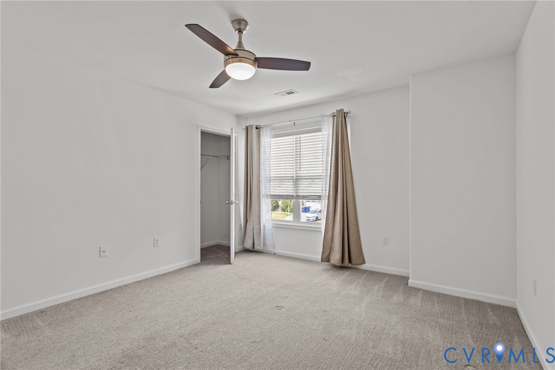 4237 Wells Ridge Court Chester, VA 23831 - Photo 25 of 47 an empty room with a empty space and a window
