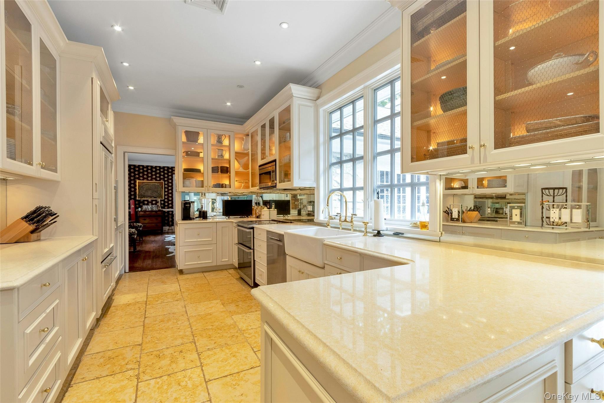 55 Mountain Farm Road Tuxedo Park, NY 10987 - Photo 13 of 42 a large white kitchen with lots of counter top space
