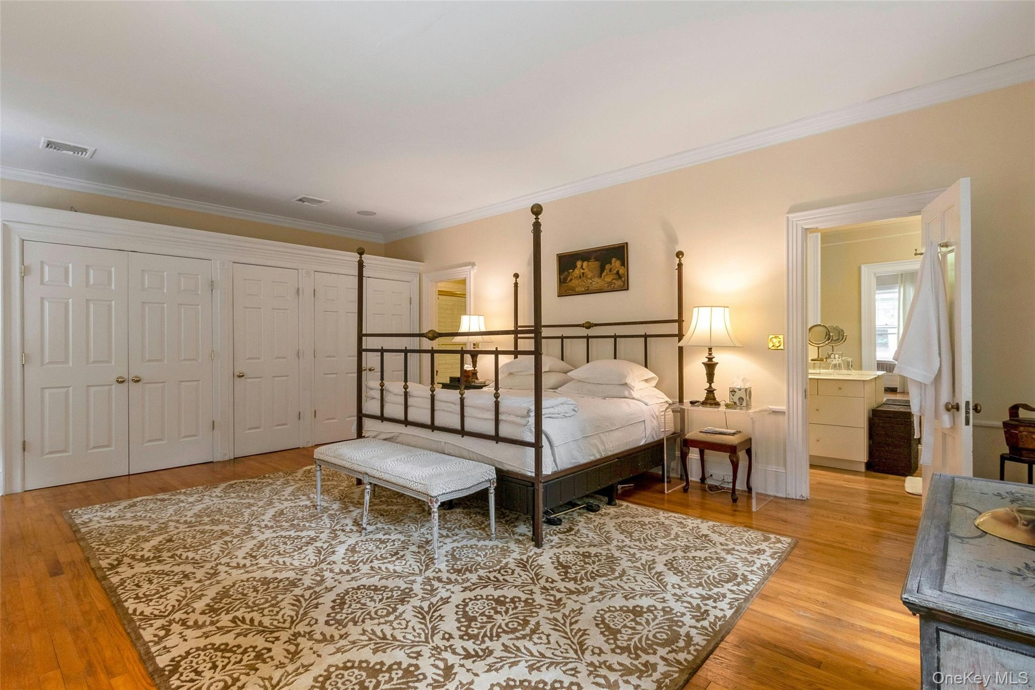 55 Mountain Farm Road Tuxedo Park, NY 10987 - Photo 19 of 42 a bedroom with a bed and wooden floor